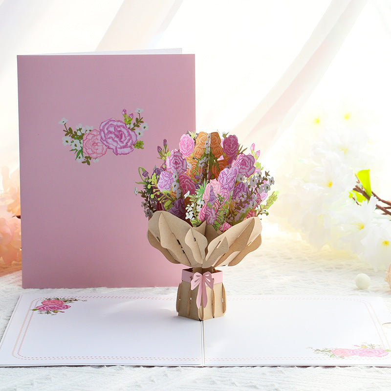 3d pop up card showing a bouquet of pink roses.