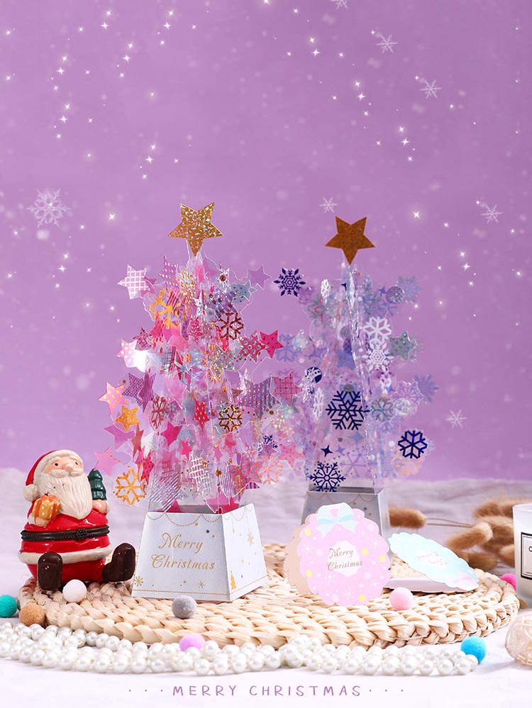 pink and blue paper and pvc pop up christmas trees together